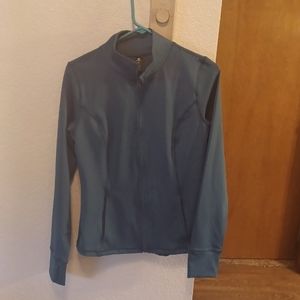 A zip up after wok out jacket size M . Worn 2 times